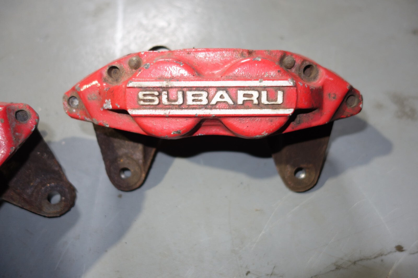 JDM SUBARU IMPREZA WRX STI OEM FRONT 4 POT BRAKE CALIPER PISTON LEAGACY FORESTER